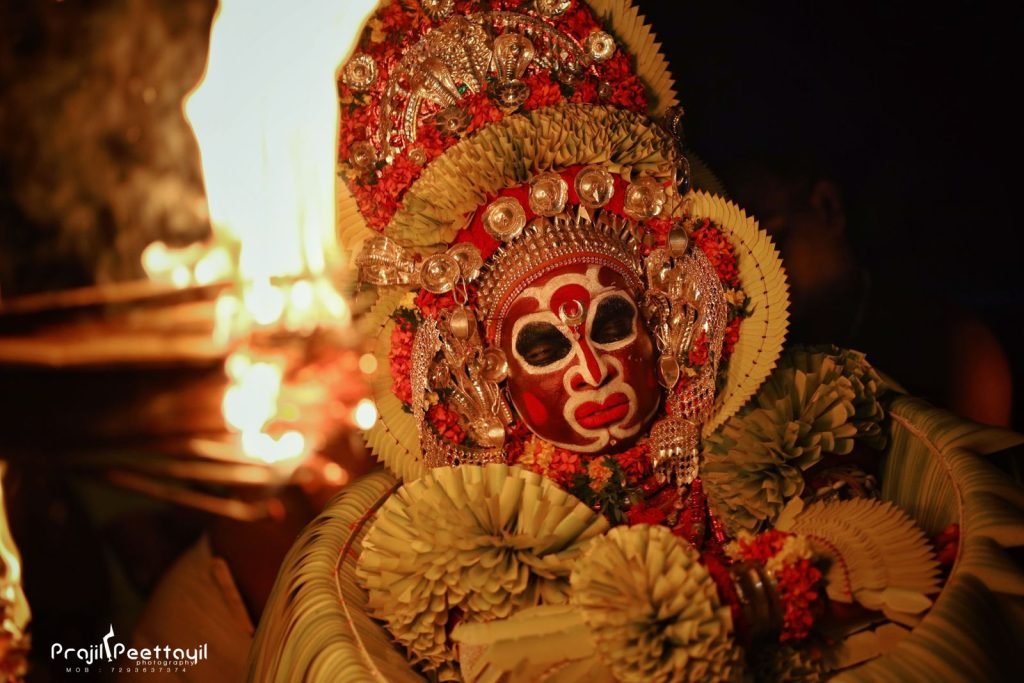 23 Karimchamundi theyyam photos