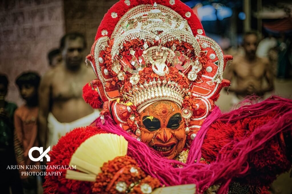 vishnumoorthi theyyam face