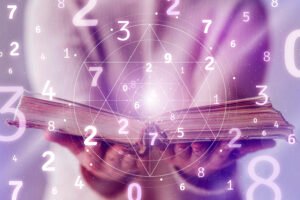 Manifestation concept with mystical numbers, sacred geometry, and an open book symbolizing energy alignment and spiritual guidance.