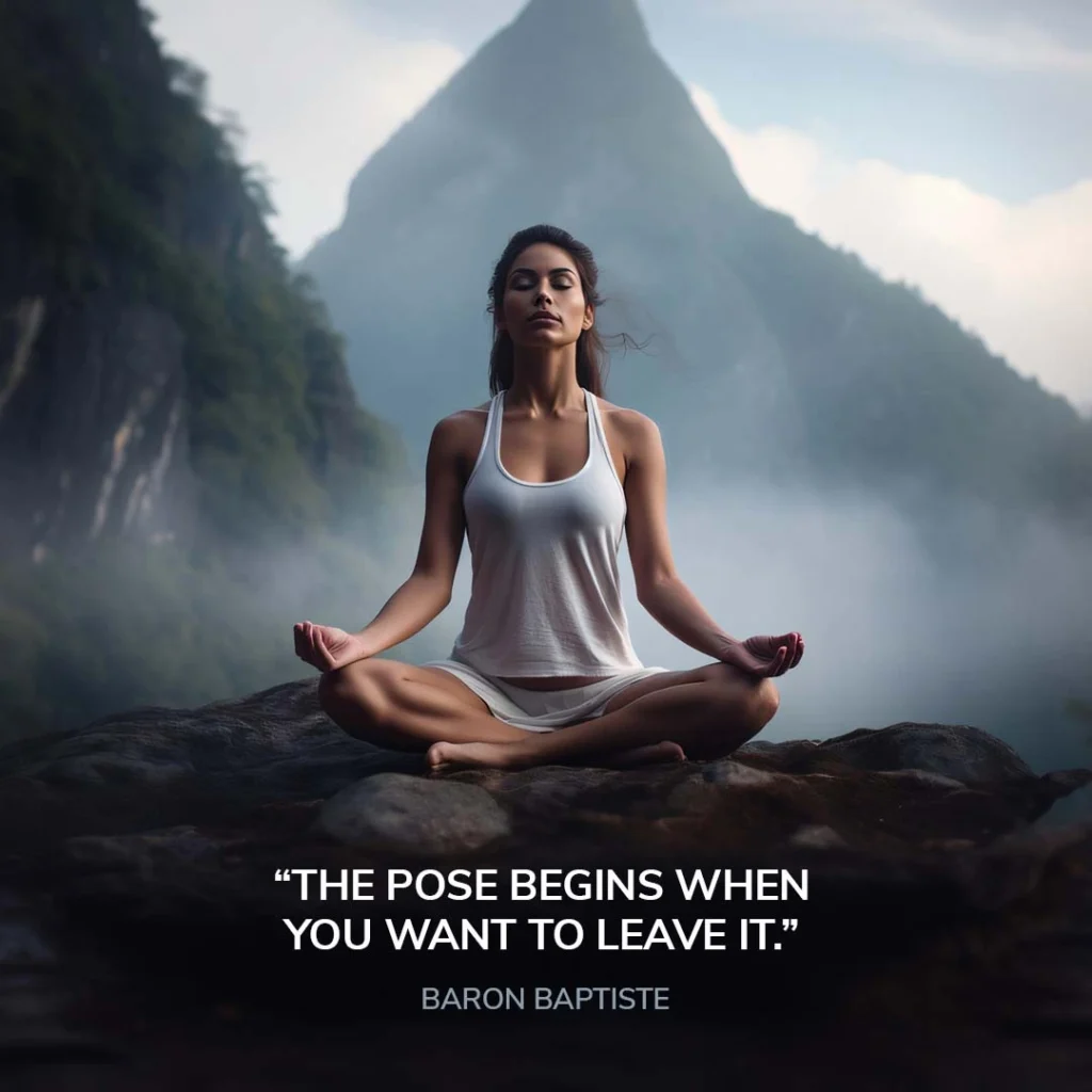 Inspirational yoga quote by Baron Baptiste with woman meditating in lotus pose on a mountain cliff surrounded by misty nature.