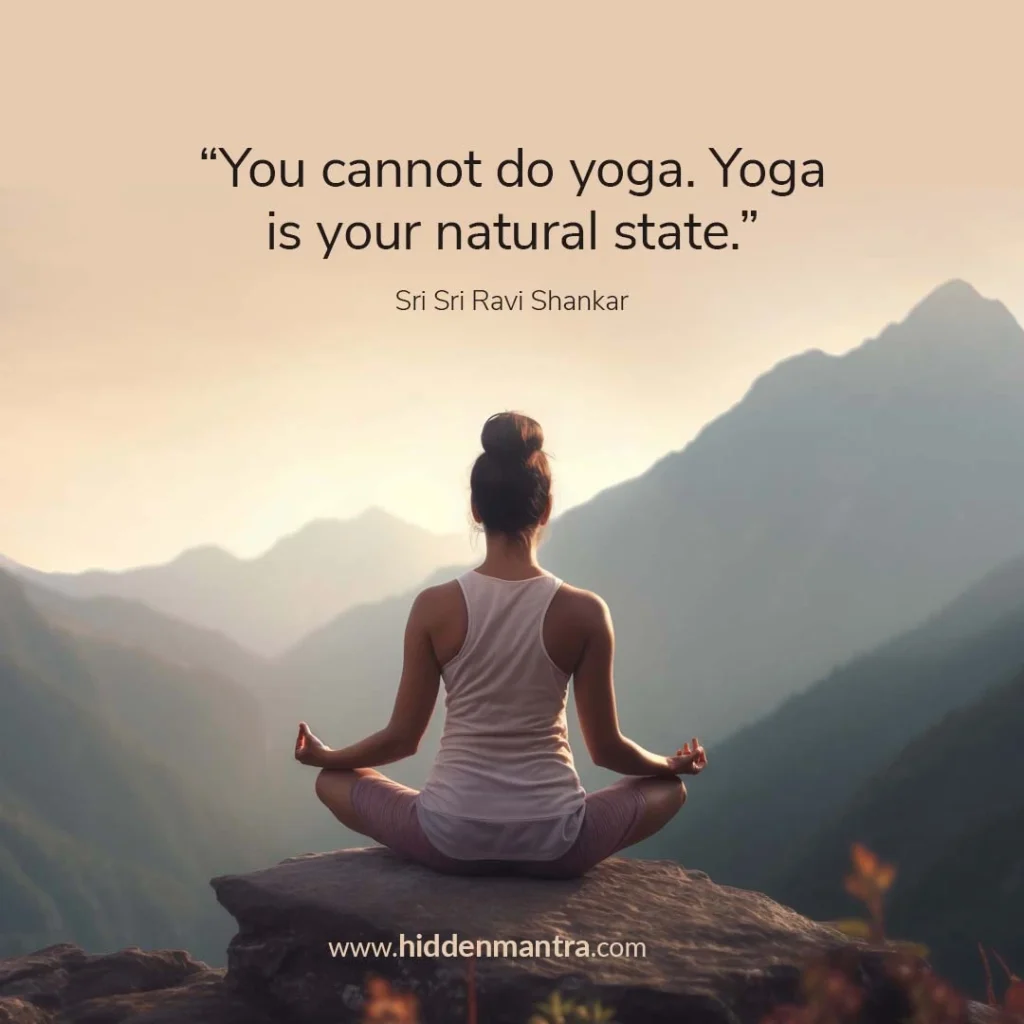 Inspirational yoga quote by Sri Sri Ravi Shankar with woman meditating in lotus pose on a mountain cliff at sunrise.