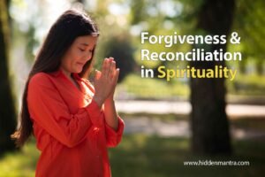 Woman in prayer pose practicing forgiveness and spiritual reconciliation outdoors.