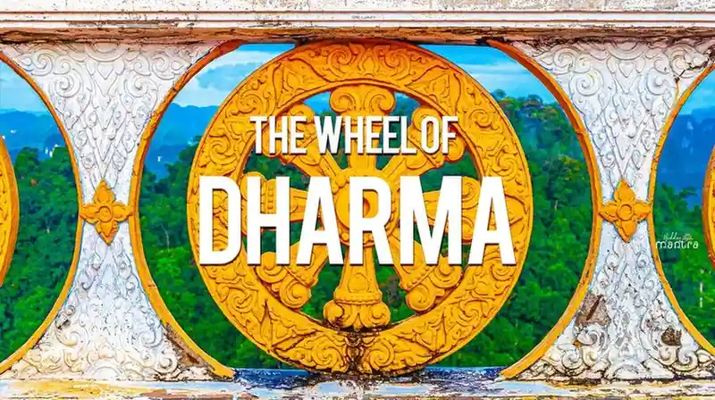 Golden Wheel of Dharma with ornate carvings, framed by a decorative arch, set against green hills and blue sky, with the text The Wheel of Dharma.